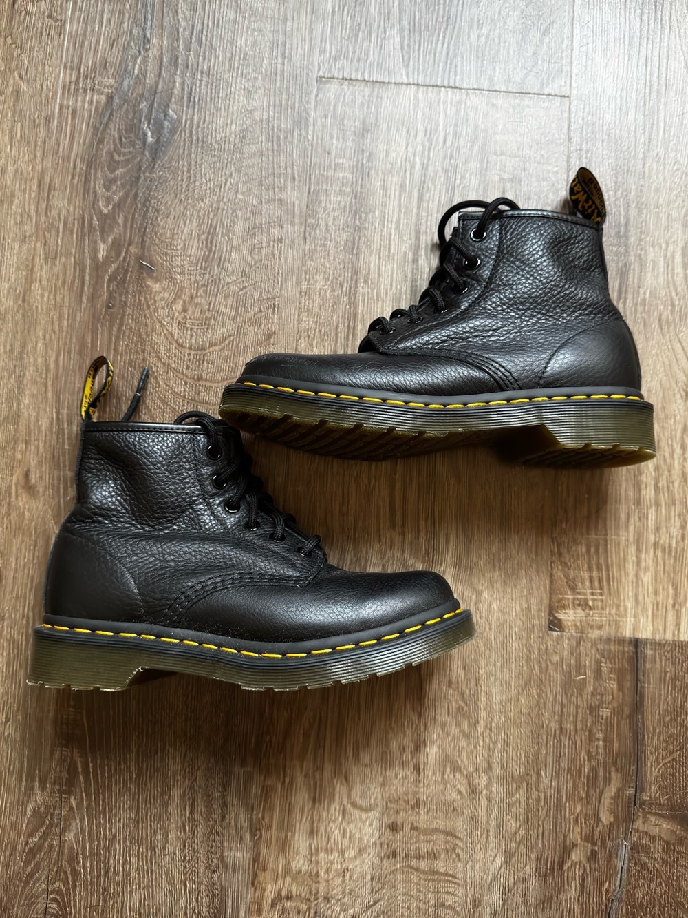 Dr. Martens Black Leather Kids 6-Eye Boots with Yellow Stitching